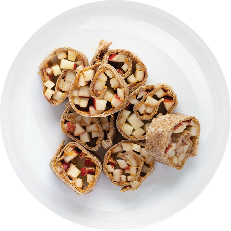 Apple-filled tortilla slices on a white plate.
