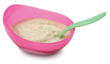 Baby cereal in pink bowl with green spoon.