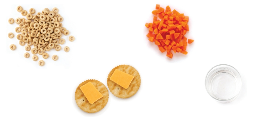 Cereal, diced carrots, crackers with cheese, and water.