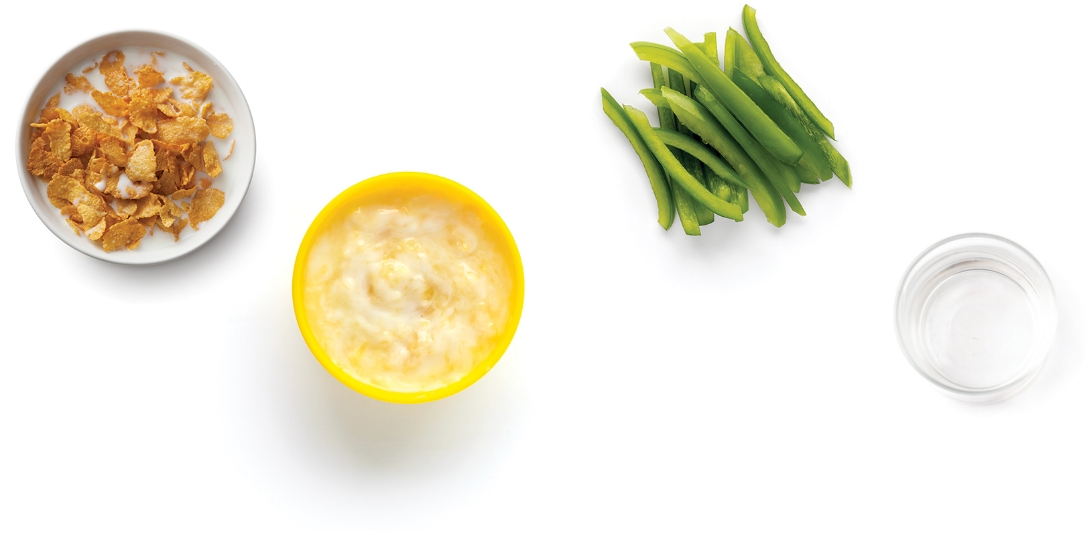 Cornflakes, yogurt, and bell pepper slices arranged neatly.