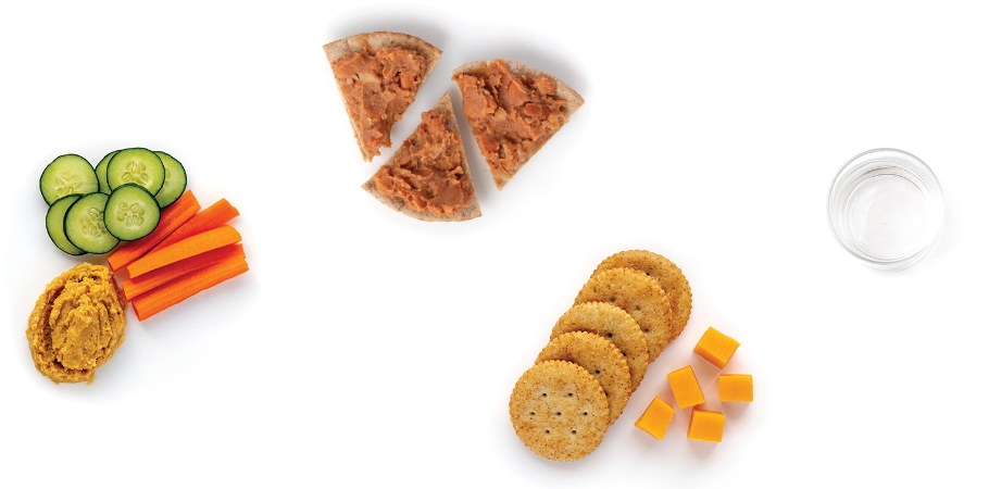 Healthy snacks arranged on a white background.