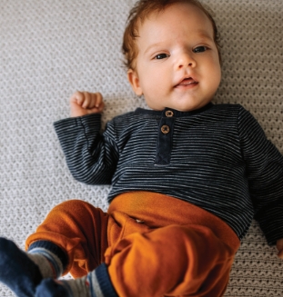 Baby lying on back
