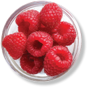 Bowl of fresh raspberries, top view.