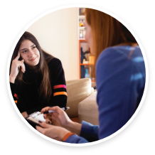 Two women engage in a thoughtful conversation