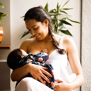 Mother breastfeeding her baby