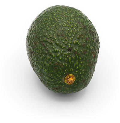 Ripe avocado with textured green skin on white background.
